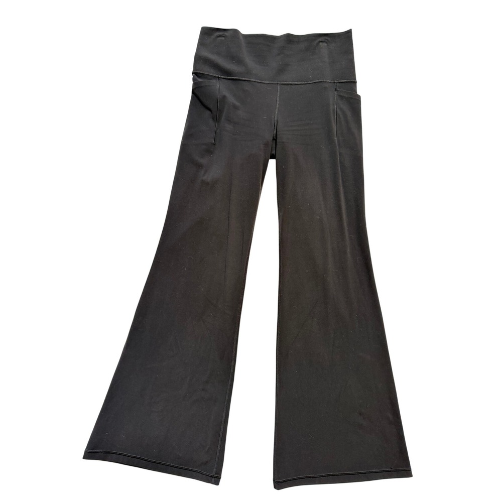 Athleta Salutation Stash Flare Pant Womens M/P Black Excellent High Rise Yoga